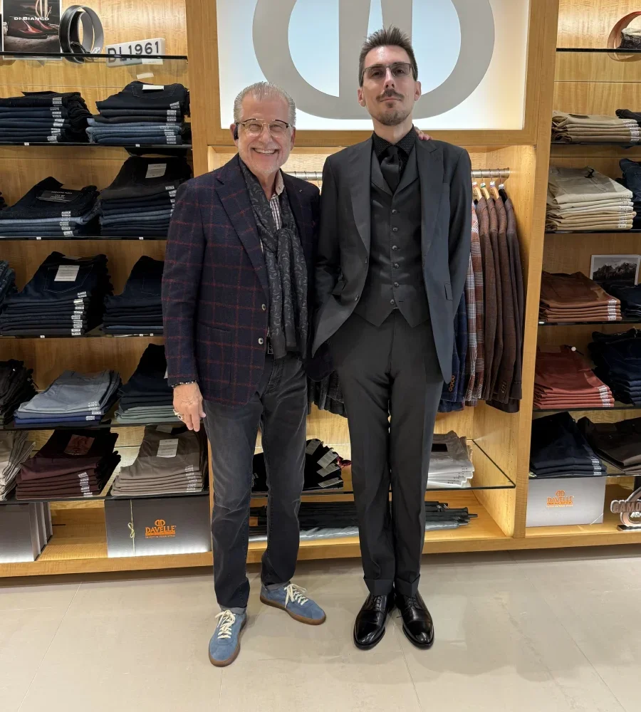 Customer wearing a black three-piece suit at Davelle Clothiers