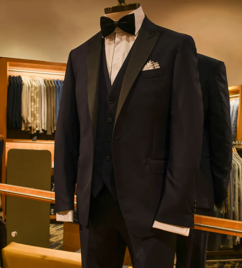 Black tuxedo with vest and bow tie at Davelle Clothiers